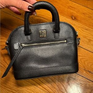 Dooney & Bourke Saffiano Domed Zip Satchel in black leather. (No extended strap)